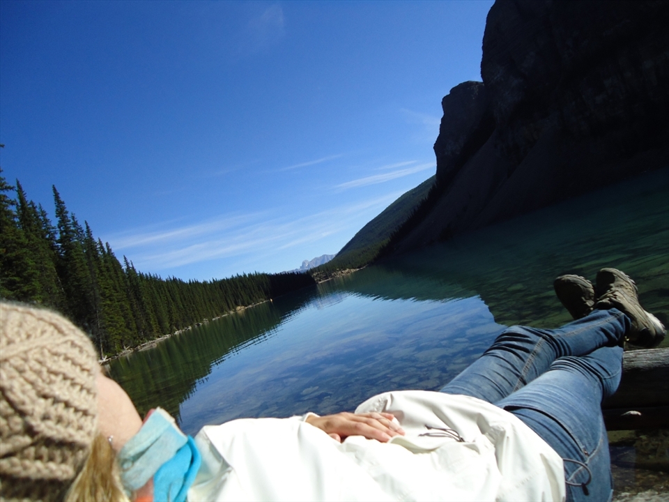 That self shot picture i took after i gave up of a trail cause i was feeling a little bit dizzy. I found a big rock and i stayed there watching the sunrise until i got better to come back home. That lake is Morraine.