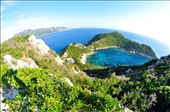Corfu is a Greek island and for its natural treasures I think is a God’s blessed. 
Porto Timoni in the northwest part of Corfu reveals breathtaking view.
It is said that the smaller bay on the left of the photograph was created (or at least enlarged) by an exploding mine which drifted onto these rocks.
: by nevena-chervenakova-journal, Views[1142]