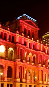 Brisbane, Aust: The Treasury Building, completed in 1928, has now been converted to a casino in 1995. Each phase of construction (there were 3 phases) uses a different type of sandstone. The red flood lights surround the building highlighting it against the rest of the city. Or are they using the psychology of colour to get you to enter or leave the building 'in the red' (in debt): by newhome, Views[463]