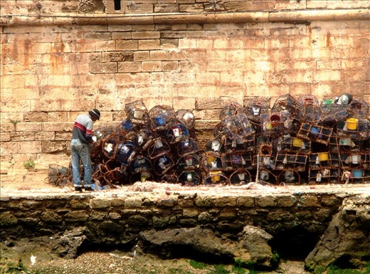 A mess of cray pots and lines inside the fortress sea wall.