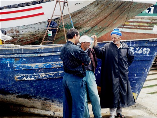 Fishermen spinning yarns about last night's catch.