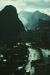 Sunset in Cat Ba Island , Viet Nam

Another photo, I took it on Cat Ba Island - Hai Phong - Vietnam in August 2012. This is the sunset, I stood from the window of the hotel to take pictures. This photo I took it through a glass, so it seems that picture is blue. This is where I met these people, they are too hard and fatigue to survive. In a magnific island, tourism developed. Rich exist side by side with them.  They are poor fishermen, the orphan, thief, swindler, .... An island of everything. When you have a child, she spent long days on the beach to sell some of the crab, then it stopped and robbed of money by them thug. It is guilt and helplessness when you have no choice but to stand and remote view. Since that moment. This beautiful island with me just a blue picture.: by nguyenminhngoc, Views[247]