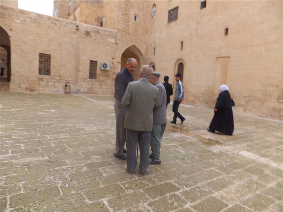 Men and women in the communal courtyards in mosques.