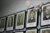 This photo will always hold a place in my heart. It was taken down a hallway in the Auschwitz Concentration Camp. They had several photos of some of the people killed during the genocide. The hallway was completely silent. The only thing you could hear were the sounds of teardrops hitting the floor.: by nickp, Views[681]