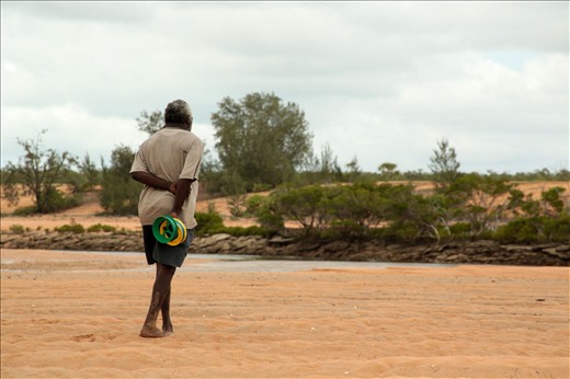 Banthay walking back from Fourth Creek after catching six fish on a hand reel in the space of an hour.