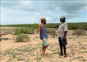 Simon, a remote area nurse, bumps into Banthay, a traditional owner of the land,  on the sand dunes that divide entangled mangroves and the ocean at Ganpura.: by nickyakehurst, Views[315]