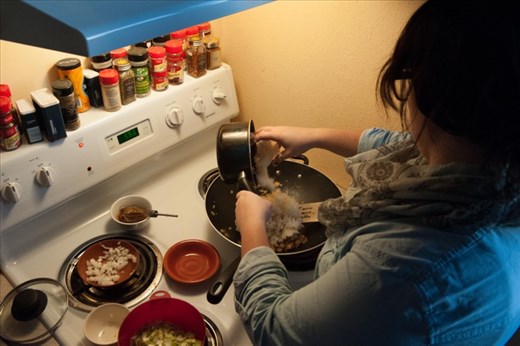 Everything needed for nasi goreng is combined in a wok