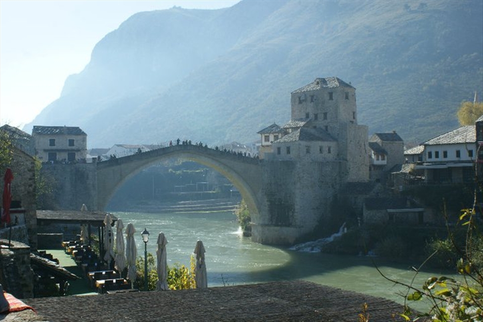 Mostar with its famous bridge. Light and water play perfectly.  