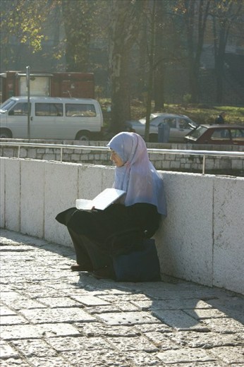 Girl begging for money on the bridge in Sarajevo.She lost her familly during war