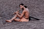 the solitary flute-man at sunset, spreading music to the entire volcanic beach.: by nikolasmavrikakis, Views[1933]
