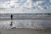 The ocean temperature rarely reach above 15 degrees Celsius during the summer, but that's nothing that prevent lively people from taking a trip to the beach at Jammerbugten in Northern Denmark. Excitement showing as the water gets barely warm enough to swim in, though still not warm enough for the accompanying loyal dog Lou that jumps in desperation to avoid the ice cold water.: by nilsskovgaard, Views[651]