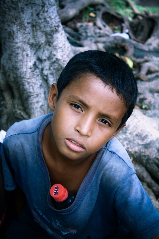 Street Urchin:
La Paz is crowded by kids soliciting for money. I saw him at a park. There was something about the expressions on his face that caught my attention: a cocktail of despair, anguish, helplessness and agony all throwing a thin curtain over leftovers of a lost smile. When I asked him why he doesn’t go to school, he said “what would I eat?” Before I could ask his name, he grabbed the coins from my hand and ran off to solicit another foreigner.
NB: For continuation of my story, please take this as photo # 2. (I could not change the order of the photos)
