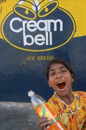 This girl is ecstatic after I bought her biscuits and a drink in Pushkar.: by njrussell, Views[192]