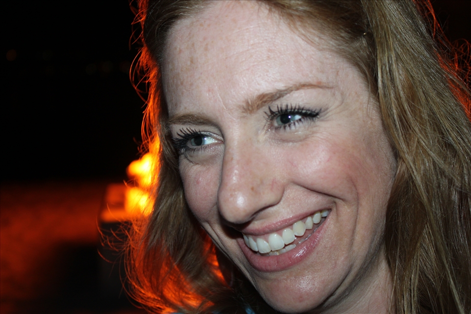 San Diego CA, a friend who's camera shy enjoying bonfire and fireworks