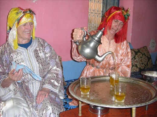 In Berber Dress After Lunch in Ourika Kelly Pouring Tea