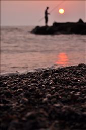 In the evening, when the sea was calm, the sun was going down and the sky was painted pink and orange, we were used to go fishing. It was the perfect moment for meditation and thinking about yourself. We were such addicted to this. We were always sitting there looking at the sunset, and hoping to catch something for dinner of course! so relaxing!!: by nomadforever, Views[371]