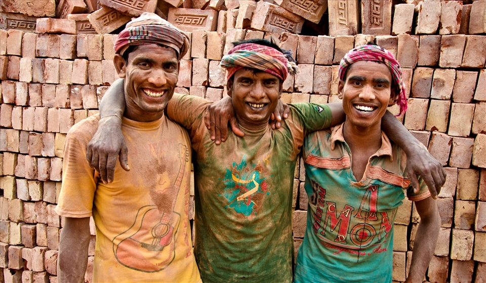 Between work, they do make time to gossip and smile 