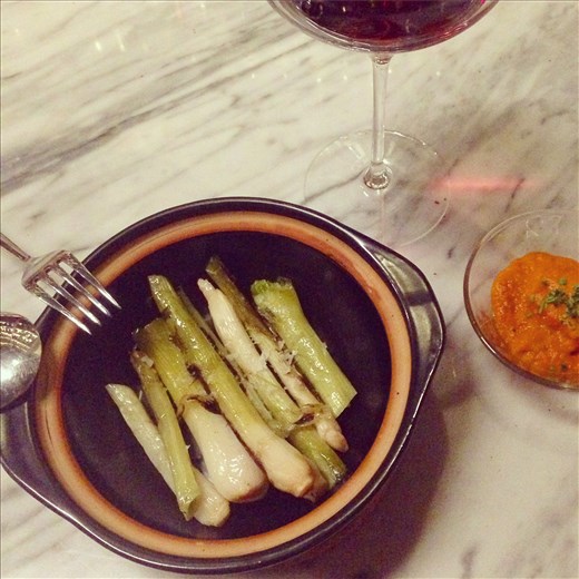 Chargrilled calçots (Catalonian spring onions) sprinkled with sea salt & accompanied by salsa romesco
