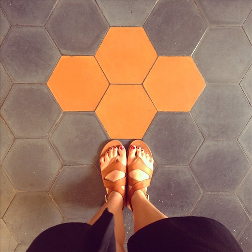 Honeycomb tile flooring at the chic café-bistro-workspace La China Mandarina