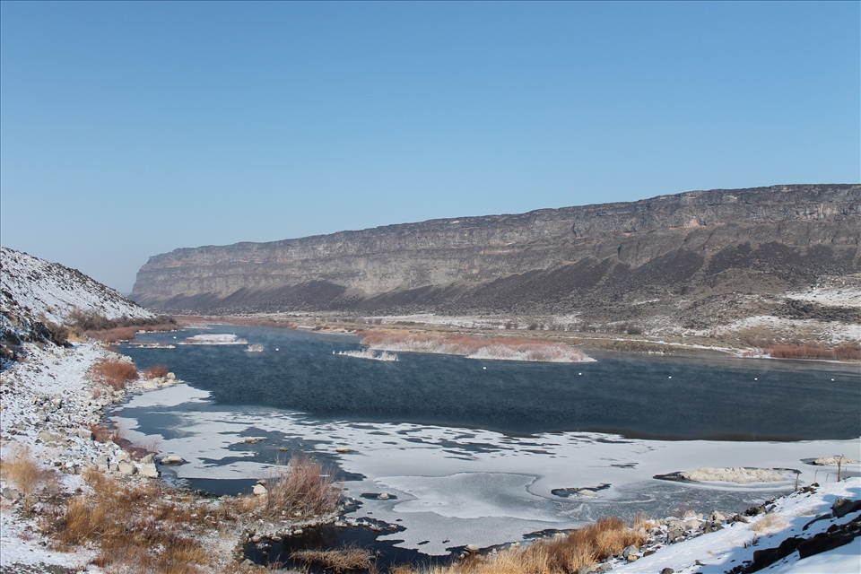 Away from the sun; water appears saturated in blue.