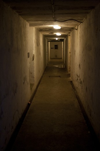 One of the corridors that run underground at Northead. These tunnels were built during the war to look out to sea and also facing the city. While many that often led to gun emplacements are now blocked off, a few are still open to the public to explore. Shot at F4.5, Shutter speed of 1/30sec, I.S.O 800 with a Focal Length of 34mm.