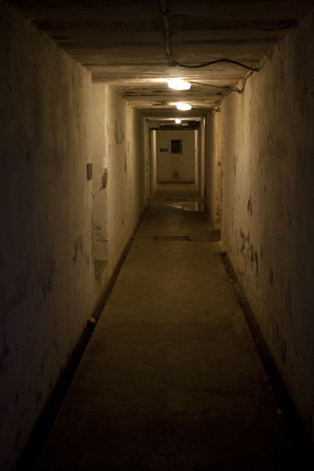 One of the corridors that run underground at Northead. These tunnels were built during the war to look out to sea and also facing the city. While many that often led to gun emplacements are now blocked off, a few are still open to the public to explore. Shot at F4.5, Shutter speed of 1/30sec, I.S.O 800 with a Focal Length of 34mm.