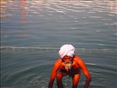 Emerging from The Pool of Nectar. An elderly pilgrim climbs out of the sacred pool after a ritual bath.: by notallwhowanderarelost, Views[348]