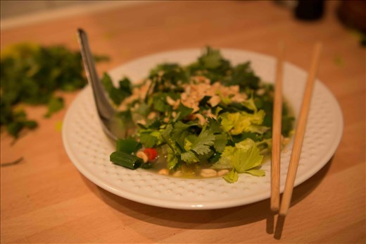 Layer the coriander, celery leaves, spring onions and peanuts and enjoy