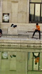 A boy skating in front of the  musée d'art moderne de la ville de Paris.: by npanda, Views[254]