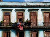I am a big fan of antique buildings - especially when it comes to windows, balconies and doors. This is one of my lucky shots, as I managed to get the right composition and exposure within 5 seconds, before the light turned green! (I was on a double decker bus, going around La Havana)

La Havana consisted of buildings which is similar to the one depicted in this photograph. Despite the richness of  it's culture, Cuba still remains one of the countries with the highest poverty rate.: by nraihanr, Views[662]