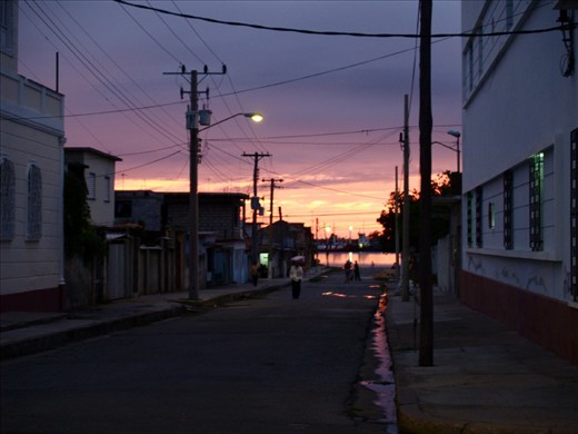 Just when I thought I have experienced Cuba in La Havana - with all its rich culture of street salsa dancing, cuban cigars, domino players, and siestas - I came across this beautiful sunset in a little town called Cienfuegos (translated to 
