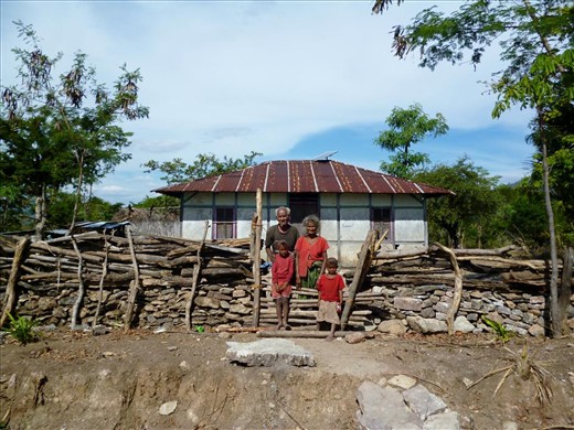 A Timorese family. Worn out, with a very humble, but always incredibly warm home
