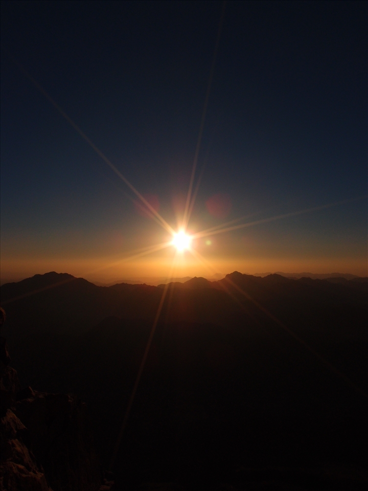 Sunrise at the Top: 7km up, after 4 hours of walking and you reach the summit of Mt Sinai (Mt Moses) and the tranquility bursts out over the horizon at 4 30am. The feeling of reward for a bit of effort floods your body as the first warmth hits your face. The air is still and there is no sound, you feel yourself sink into calmness and just watch the slowly climbing sun creep over and cast light over the landscape at your feet. It may not be the edge of space, but hey.. its not too bad.