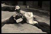 lady in Banaue, after cleaning the rice is now moving the rice to store: by nyltiak-thefool, Views[277]