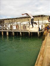 Stonetown is full of activity, but the humidity coupled with the fierce African sun makes too much walking around exhausting. In order to cool off and have some fun, local boys constantly hold jumping contests for hours off the quay.: by olie, Views[458]