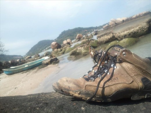 One of my important adventure acessories, my boots. Also, It  shows a nice spot I found to relax in Florianópolis, Brasil.