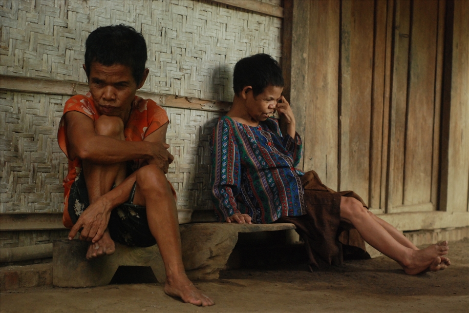 two middle-aged women of five children suffering from mental retardation since birth. they can only wait for help from the government and donors to support their lives