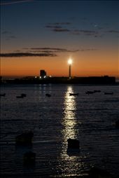 The crescent moon looming over the harbor in Cadiz.: by oncewaslost, Views[291]