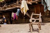 To erect homes along the slanted valley walls, Kalash houses are laid out such that the rooftop of a house is used as foundation for another house built above.  Having settled for generations on fertile river banks dotted by apricot and mulberry trees deep in the Hindukush, the Kalasha people live in tune with nature and take its provisions as blessings for their survival.: by onebackpackoneworld, Views[1186]
