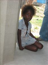 Beautiful little girl living in the batey close to the fields. 
She sat quietly next to the group of tourists to listen to the conversations. Her eyes were sad and meaningful, and her attitude timid but assertive. She seemed to know so much, yet eager to learn even more.: by onethousandwords, Views[428]