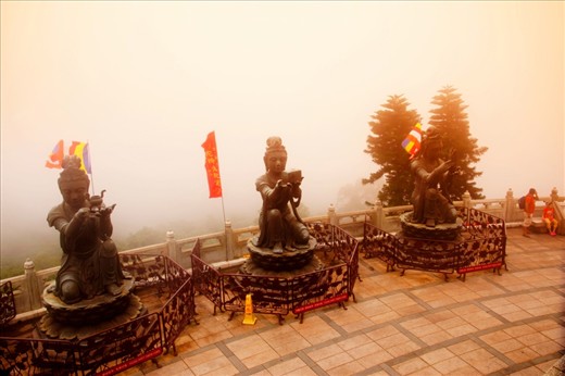 Not just the Buddha is the only attraction, here a series of religious statues outline the view as it is overcome with mist