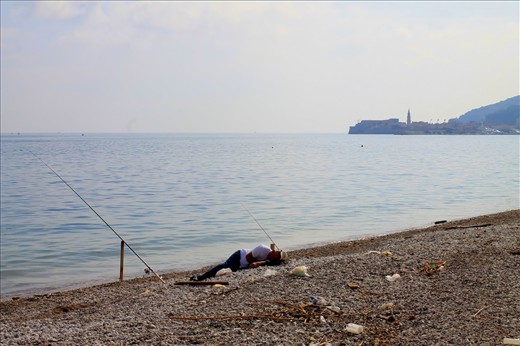 The lazy fisherman by the water