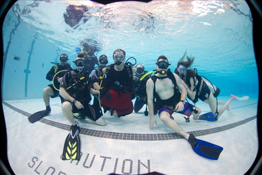filming a quadruple amputee learning to scuba dive