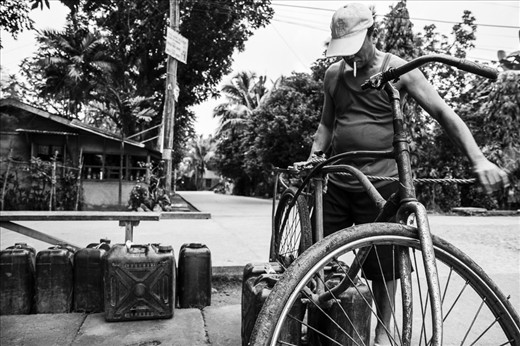 delivering water to residents as a source of livelihood for some