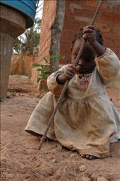 Esperanza, daughter of our cook, playing with her toy: by oscarserrano, Views[260]