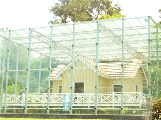 Wooden house formerly owned by an argentinian president, with a glass protection