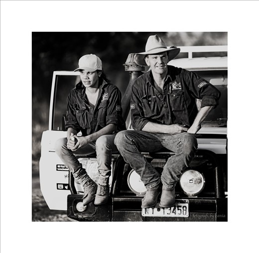 Muster break, two stock hands take a short break from mustering cattle.