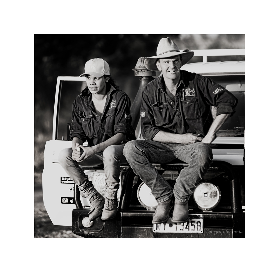 Muster break, two stock hands take a short break from mustering cattle.
