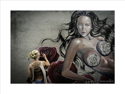 Some street art in progress, advertising one of the many tattoo studios in Kuta.