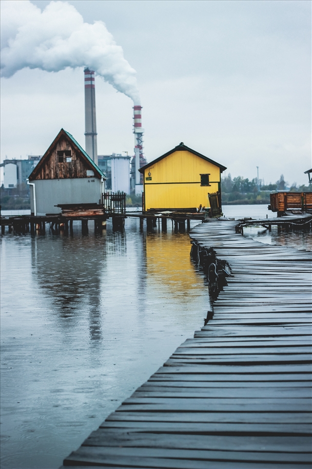 some colorful houses to cheer up the view of the still active factory nearby